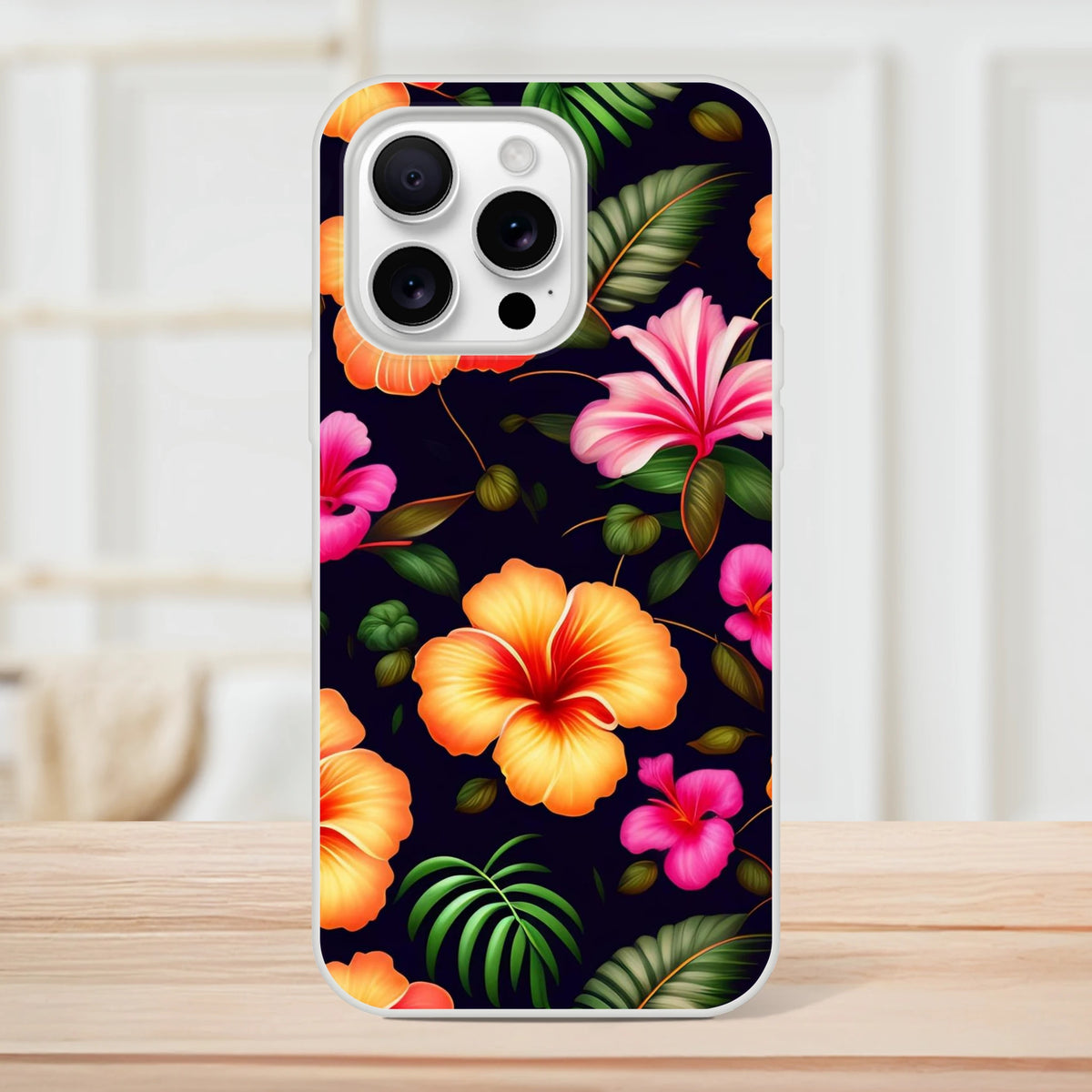 Tropical hibiscus botanical iPhone case for 13–16 with vibrant flowers and green leaves