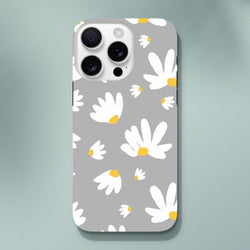 Grey iPhone case featuring a white daisy floral pattern with yellow centers on a utilitarian grey background.