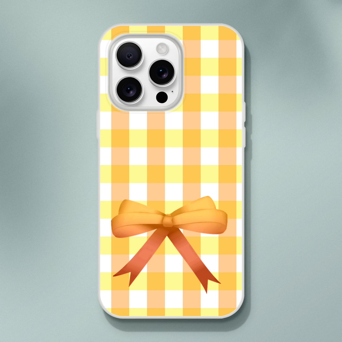 Yellow gingham bow iPhone case for 13-15, cute coquette aesthetic with a bright yellow bow.