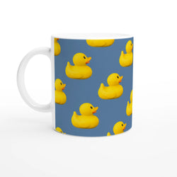 Cute rubber duck ceramic mug with blue background and repeating yellow ducks pattern.