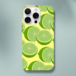 Fresh green lime slices on yellow durable iPhone case. Citrus graphic streetwear phone cover protecting devices from daily impacts.