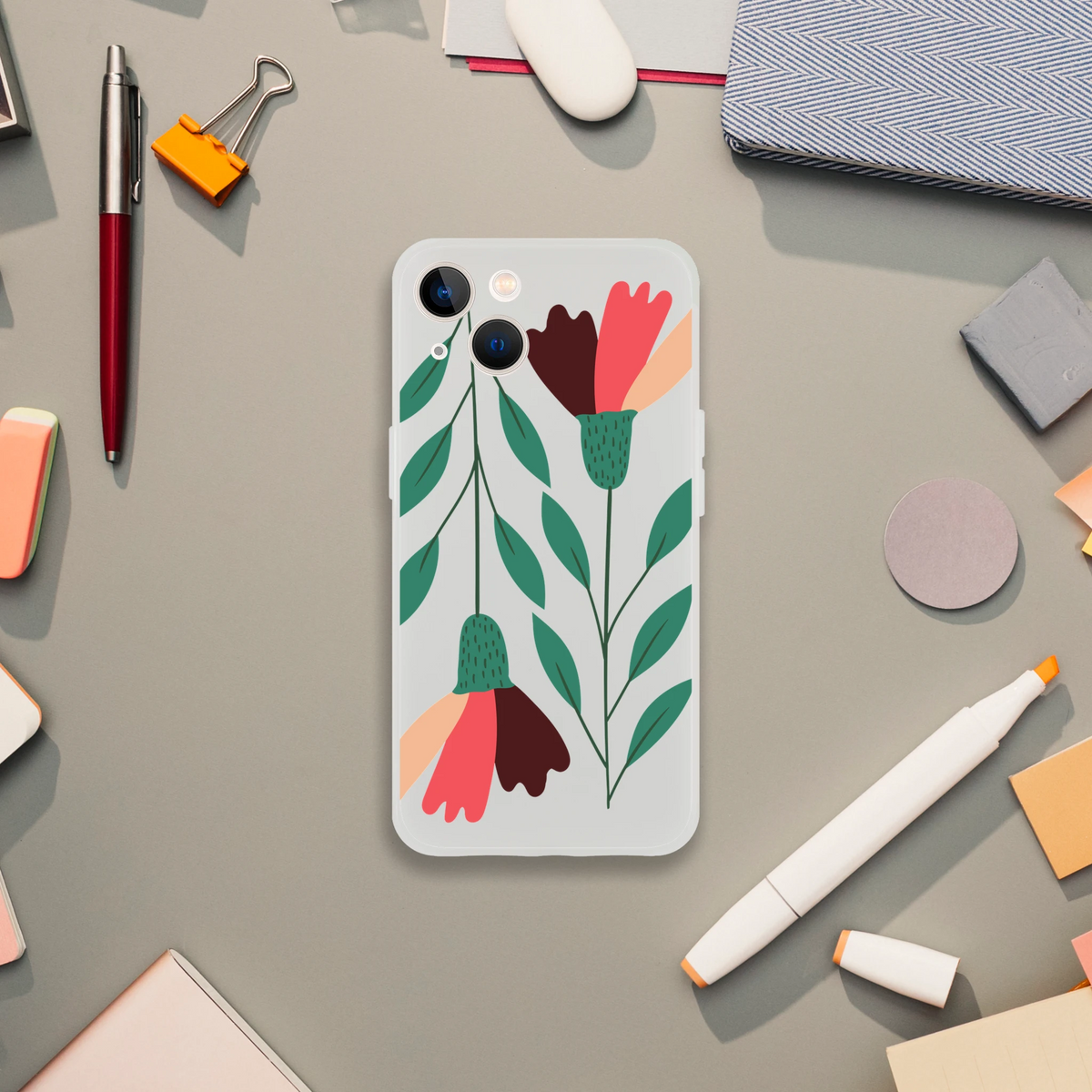 Floral phone case with green leaves and colorful blooms on a transparent back for iPhone 13-16.