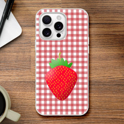 Cute pink strawberry gingham iPhone case for iPhone 13-16 with a matte finish and strawberry graphic.