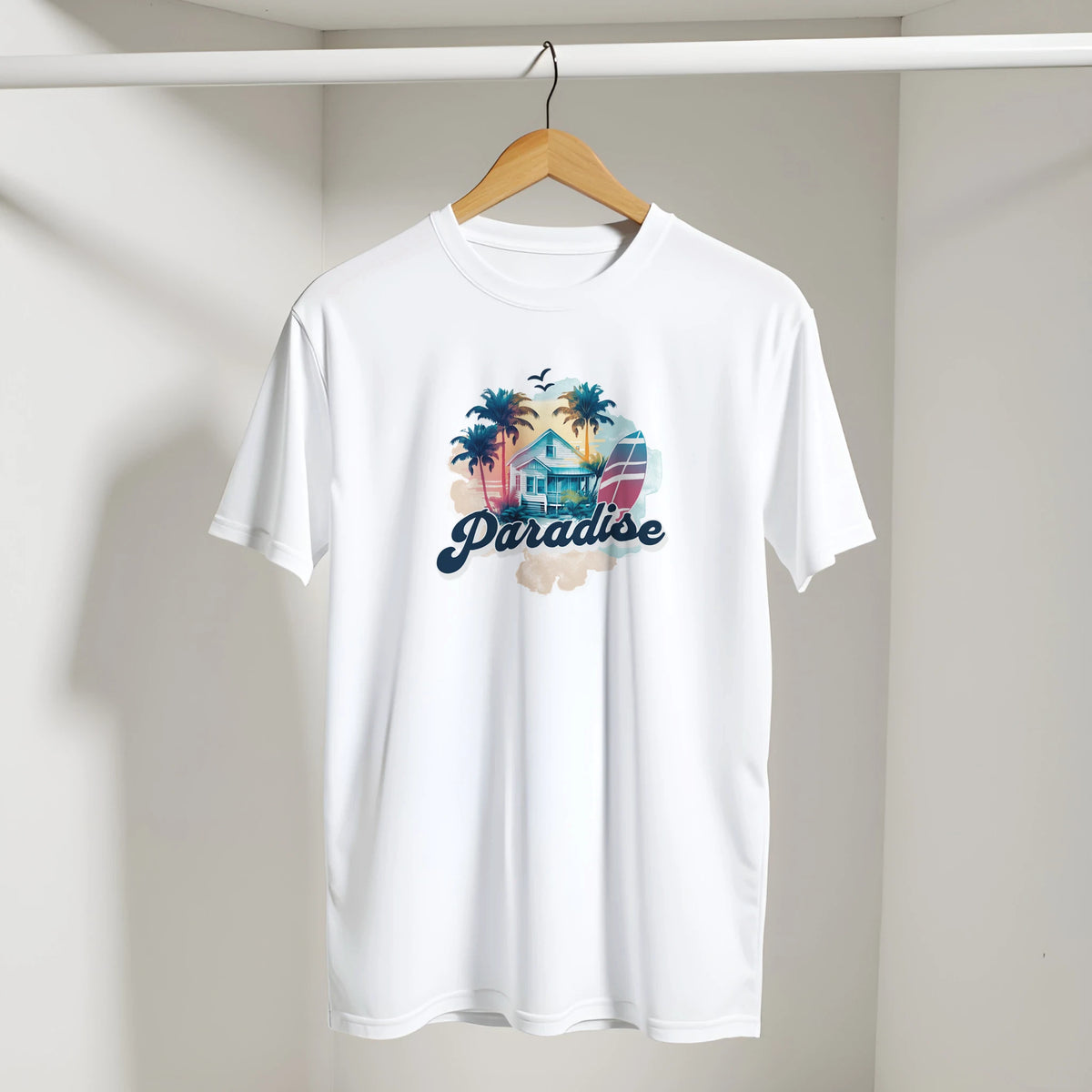 Retro Paradise women's T-shirt with tropical palm trees, beach house, surfboard, and Paradise script on white.
