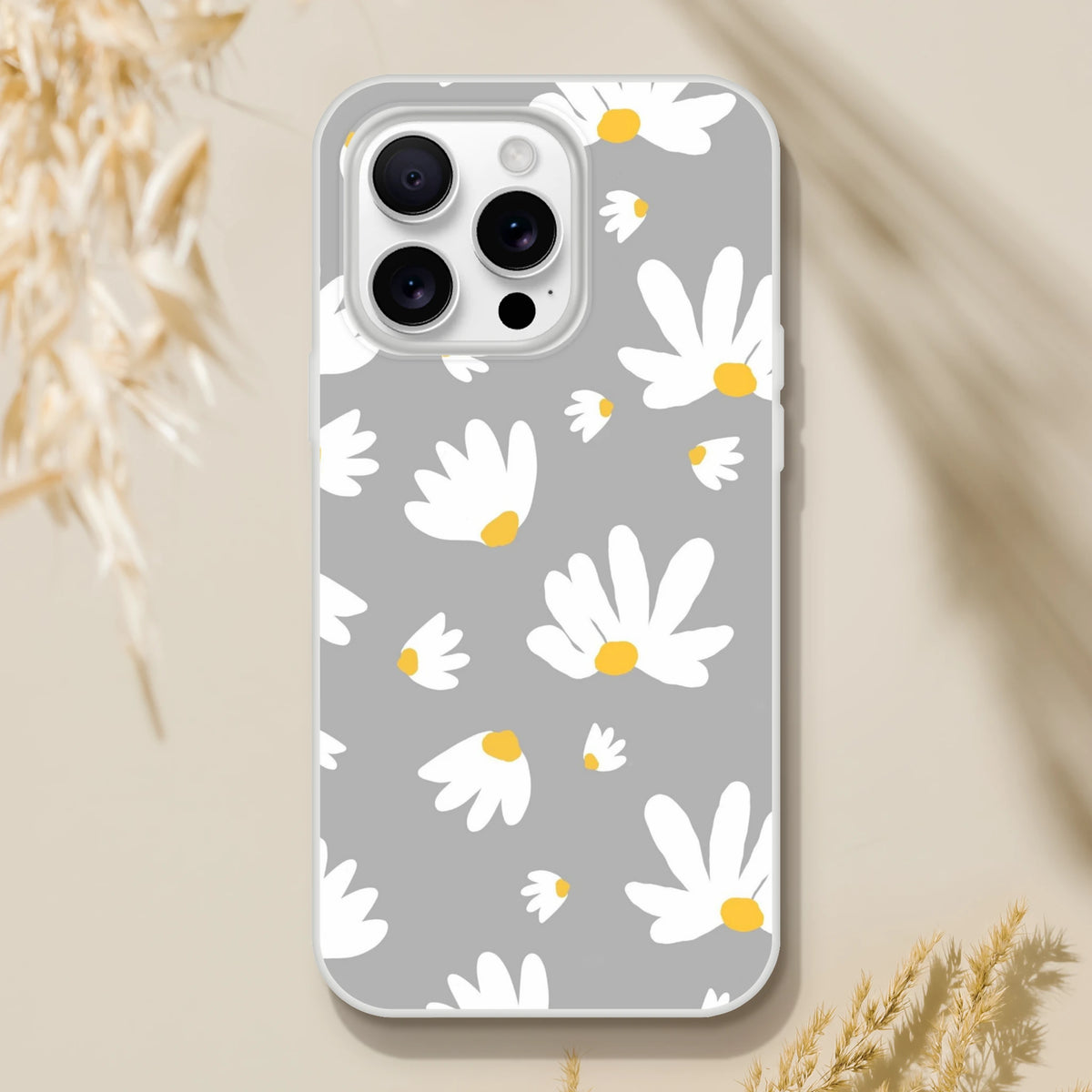Ditsy Daisy iPhone case for 13-16, gray with white daisies and yellow centers, slim matte floral cover