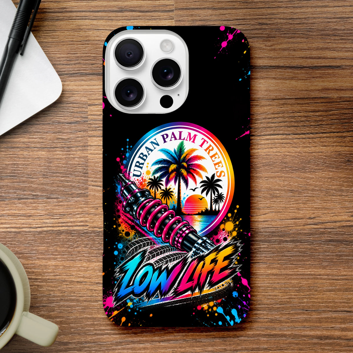Low Life Petrolhead iPhone case features Urban Palm Trees sunset graphic, shock absorber art, and colorful splatter design for modified car culture.
