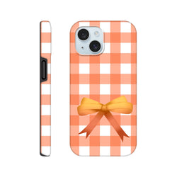 Orange gingham iPhone case with a 3D coquette bow. Tough, impact-resistant phone cover featuring a bold checkered pattern in peach and white.
