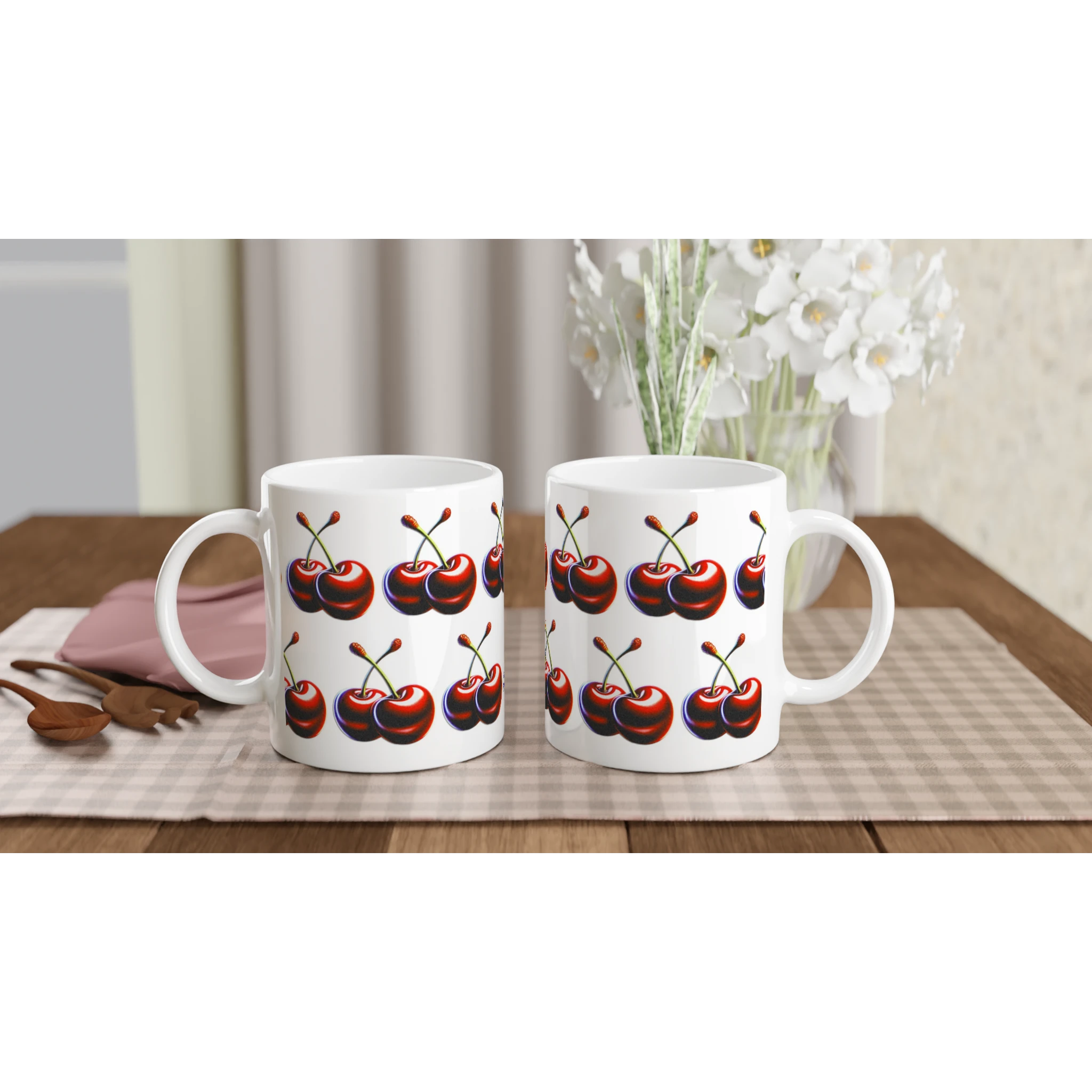 Cherry Mug Gift For Her: two white ceramic mugs with red cherry prints on a beige checkered table runner.