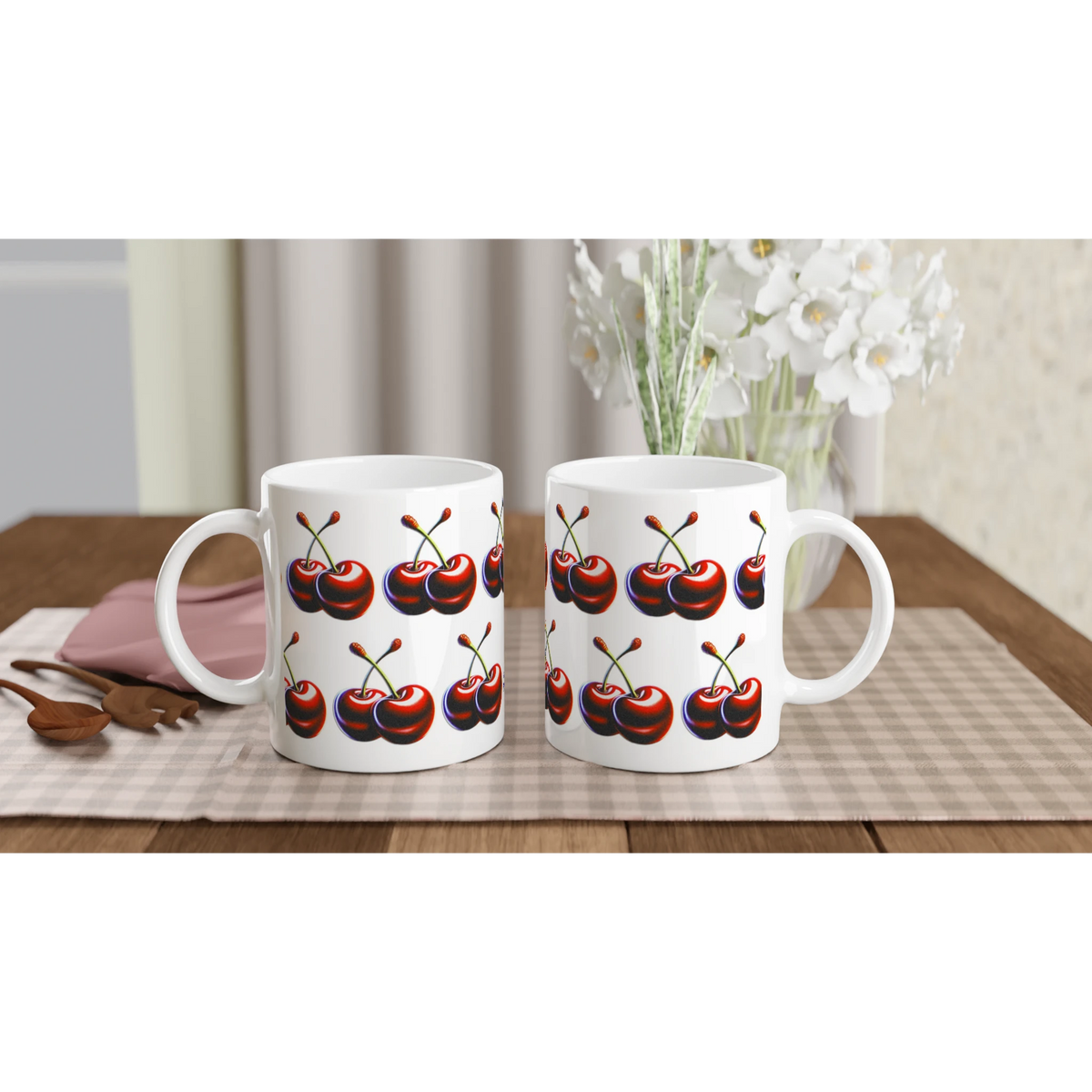 Cherry Mug Gift For Her: two white ceramic mugs with red cherry prints on a beige checkered table runner.