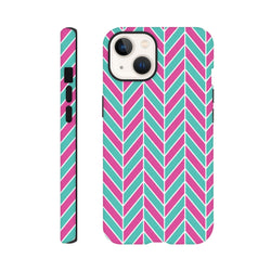 Pink and turquoise herringbone iPhone case with bold geometric chevron pattern and tough protective cover for commuting.