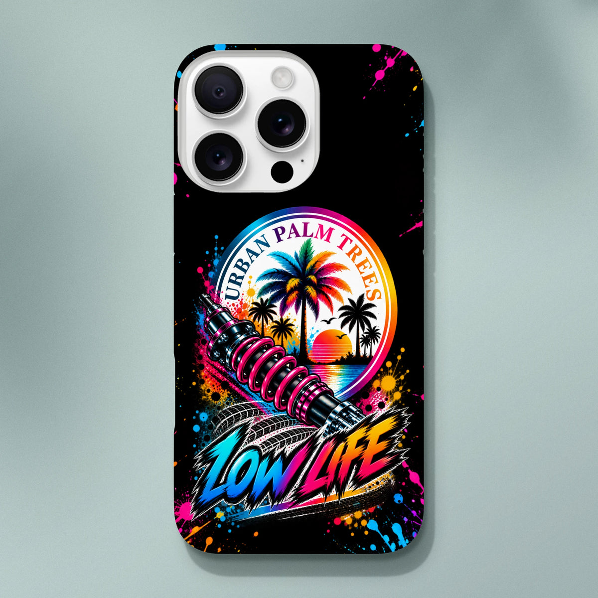 Low Life iPhone case featuring colorful Urban Palm Trees artwork, shock absorber, and neon splatter design for modified car enthusiasts.