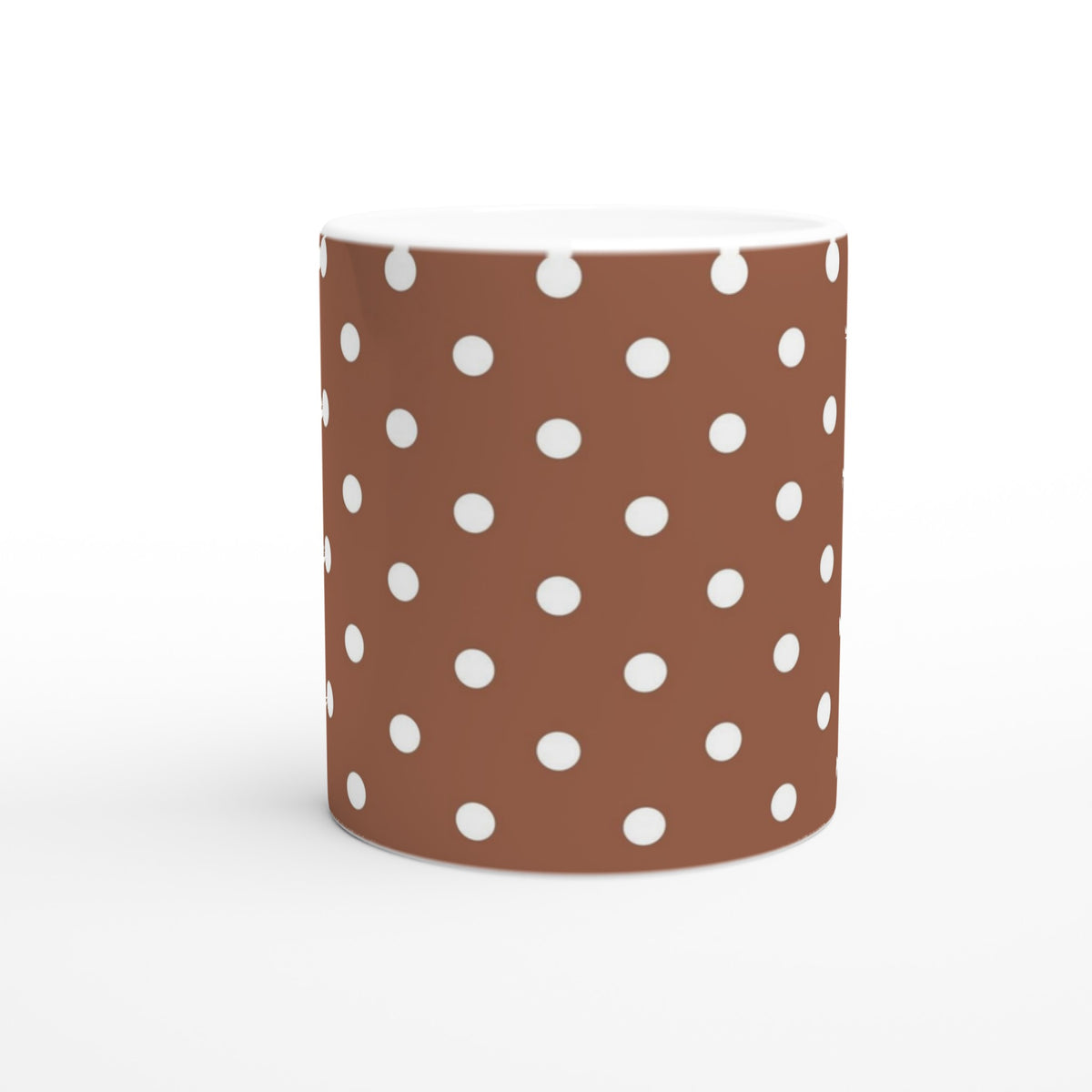 Retro brown and white polka dot ceramic mug, featuring a crisp spotty pattern for daily coffee or tea.