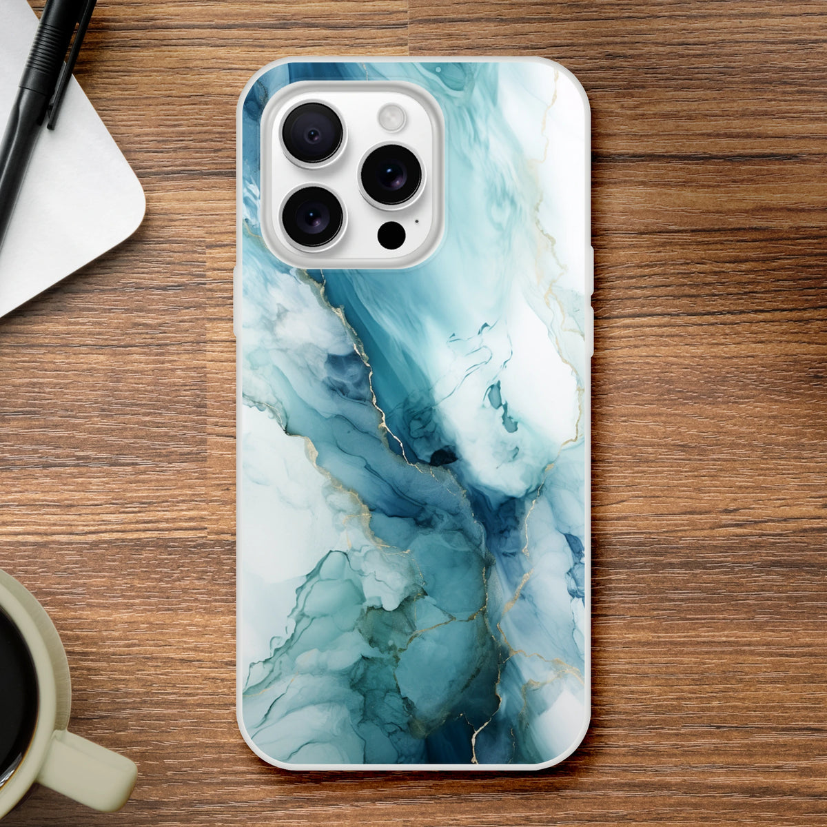 Blue Marble iPhone Case (13-16) Ocean Agate abstract, slim matte shell with durable print on wood desk.