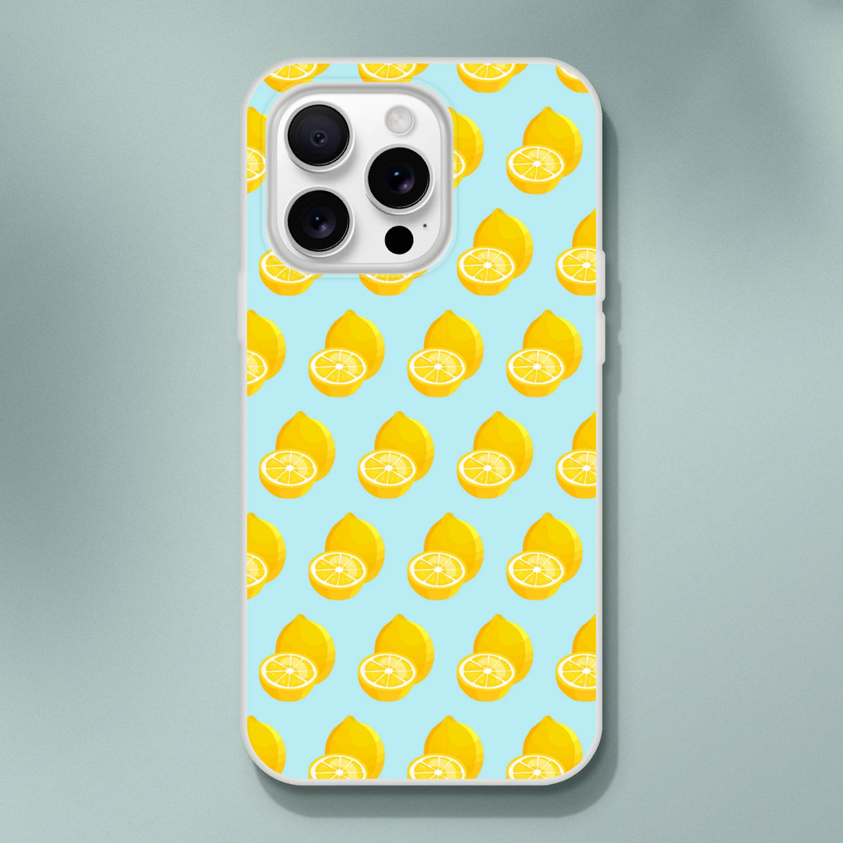 Pastel blue iPhone case featuring a cute yellow lemon pattern with whole and sliced citrus fruits for summer style.