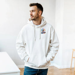 Man wearing white Full Send streetwear hoodie with colorful palm tree graphic, paired with blue jeans for a relaxed daily look.