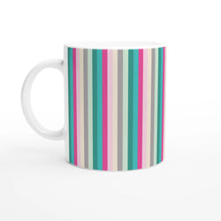 Pastel rainbow stripe ceramic mug with white handle on white background