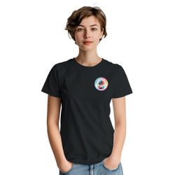 Woman wearing black retro tee with colorful "Urban Palm Trees" chest logo. Tropical style short-sleeve shirt paired with denim jeans.