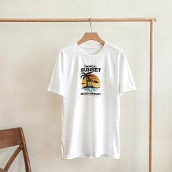 White women's cotton-blend T-shirt with tropical sunset palm trees graphic and Beach Resort text.