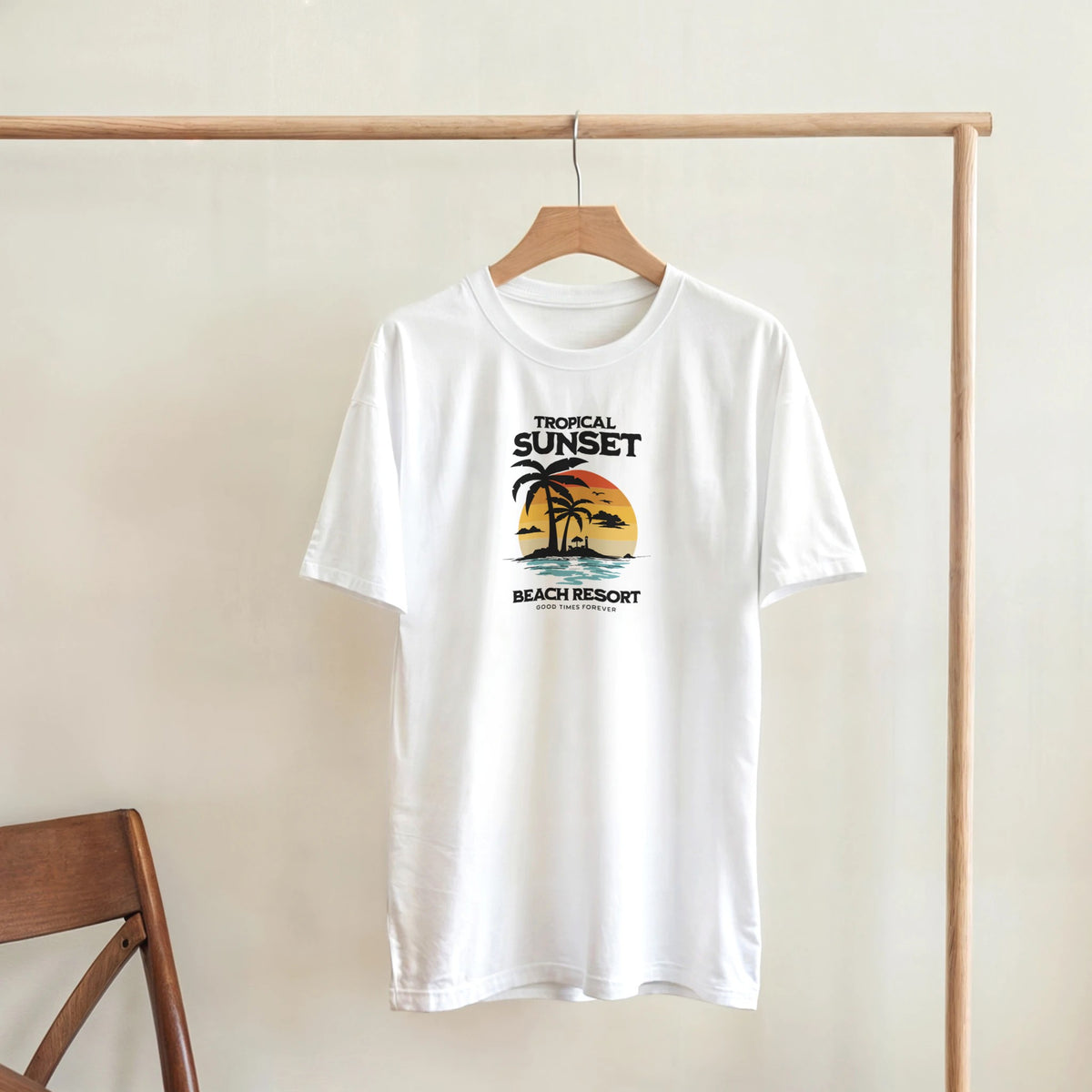 White women's cotton-blend T-shirt with tropical sunset palm trees graphic and Beach Resort text.