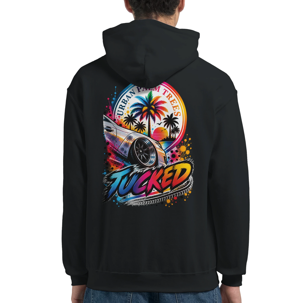Black hoodie back featuring colorful "Tucked" car culture graphic with lowered vehicle, palm trees, and Urban Palm Trees sunset design.