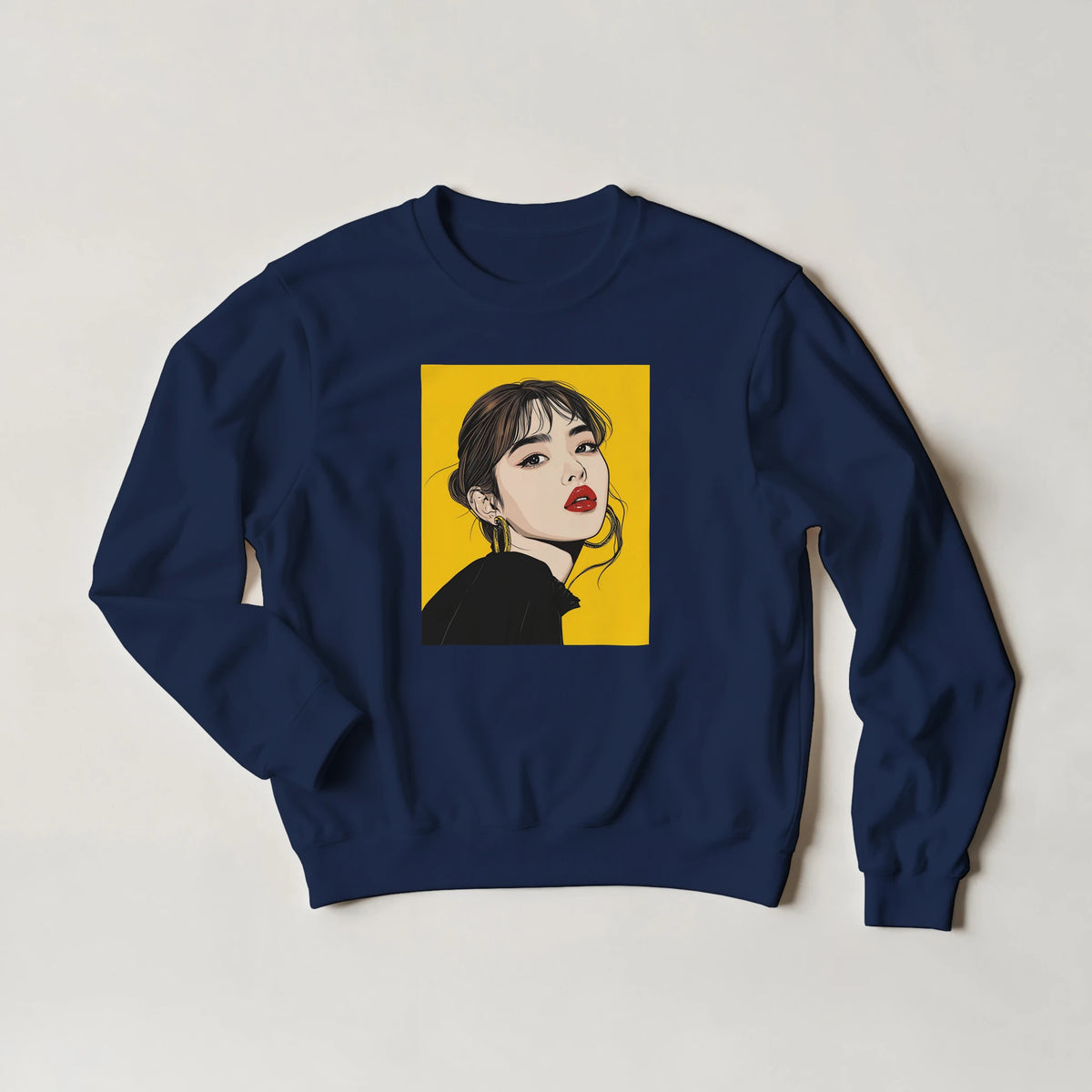 Navy blue men's sweatshirt featuring a yellow Pop Art woman portrait graphic with red lips and gold hoop earrings for streetwear style.