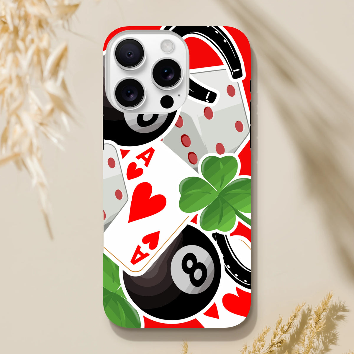 Tough iPhone case featuring a lucky charm collage with an 8-ball, ace of hearts, clover, and horseshoe graphic.