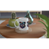 British Bulldog mug with colorful bulldog wearing sunglasses on white ceramic, placed on a wooden table.