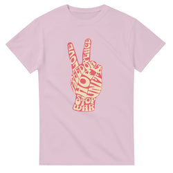 Pink women's graphic tee with a peace-sign hand formed from words like peace, love, stop war.