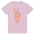 Pink women's graphic tee with a peace-sign hand formed from words like peace, love, stop war.