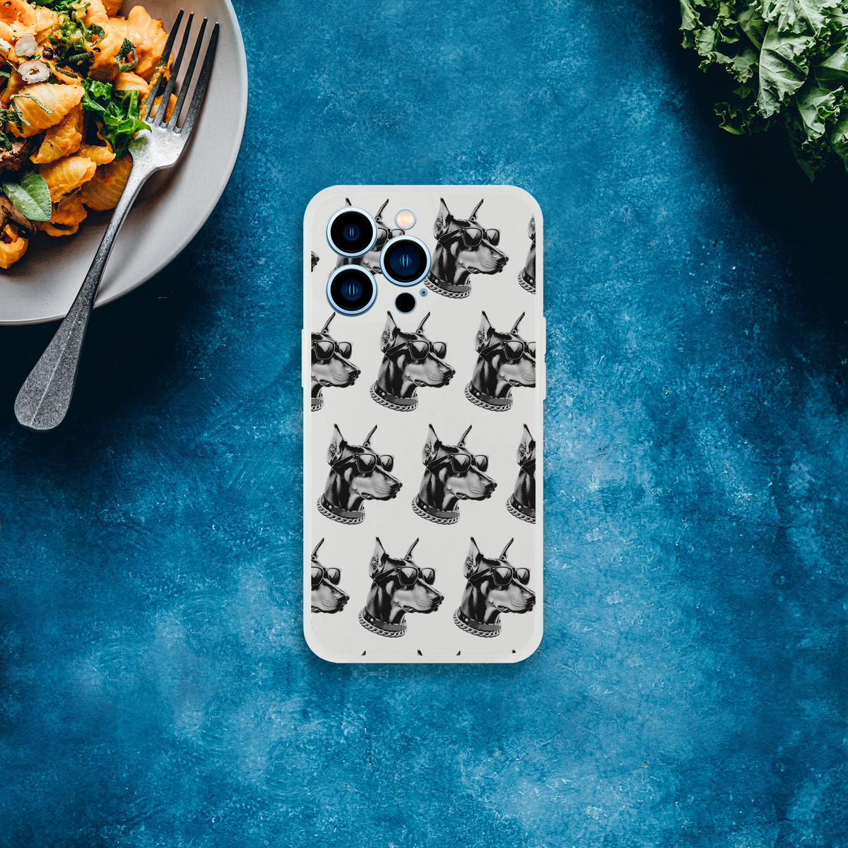 Transparent iPhone case for 13-16 with a repeating gangster Doberman pattern wearing sunglasses.