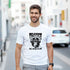 Man wearing white Trance Gorilla Graphic T-Shirt, a soft cotton blend with a black gorilla wearing headphones.