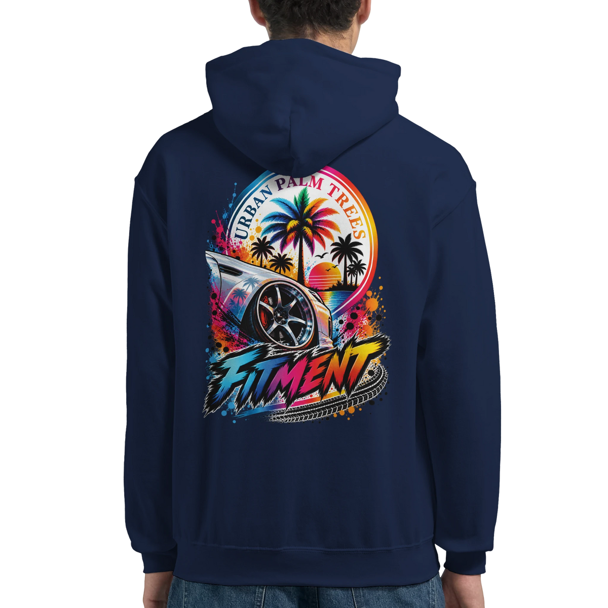 Navy petrolhead hoodie featuring a retro car culture graphic with palm trees, a tuner wheel, and colorful "FITMENT" typography on the back.