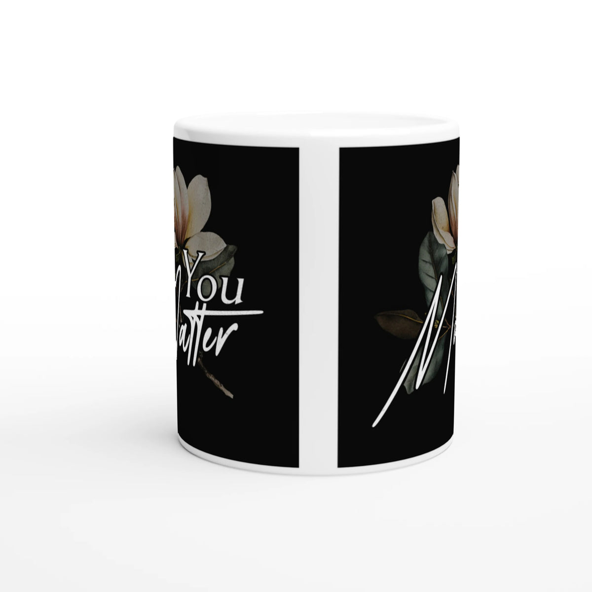 You Matter slogan mug with floral design on black panels; a ceramic mental health gift.