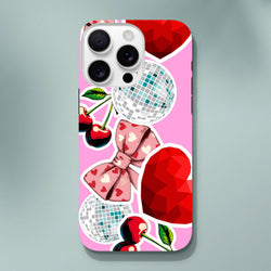 Pink Y2K iPhone case with sticker effect design featuring cherries, heart bow, disco balls, and red gem graphics for tough protection.