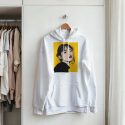 White vintage graphic streetwear pullover featuring retro brunette pop art woman illustration on yellow background.