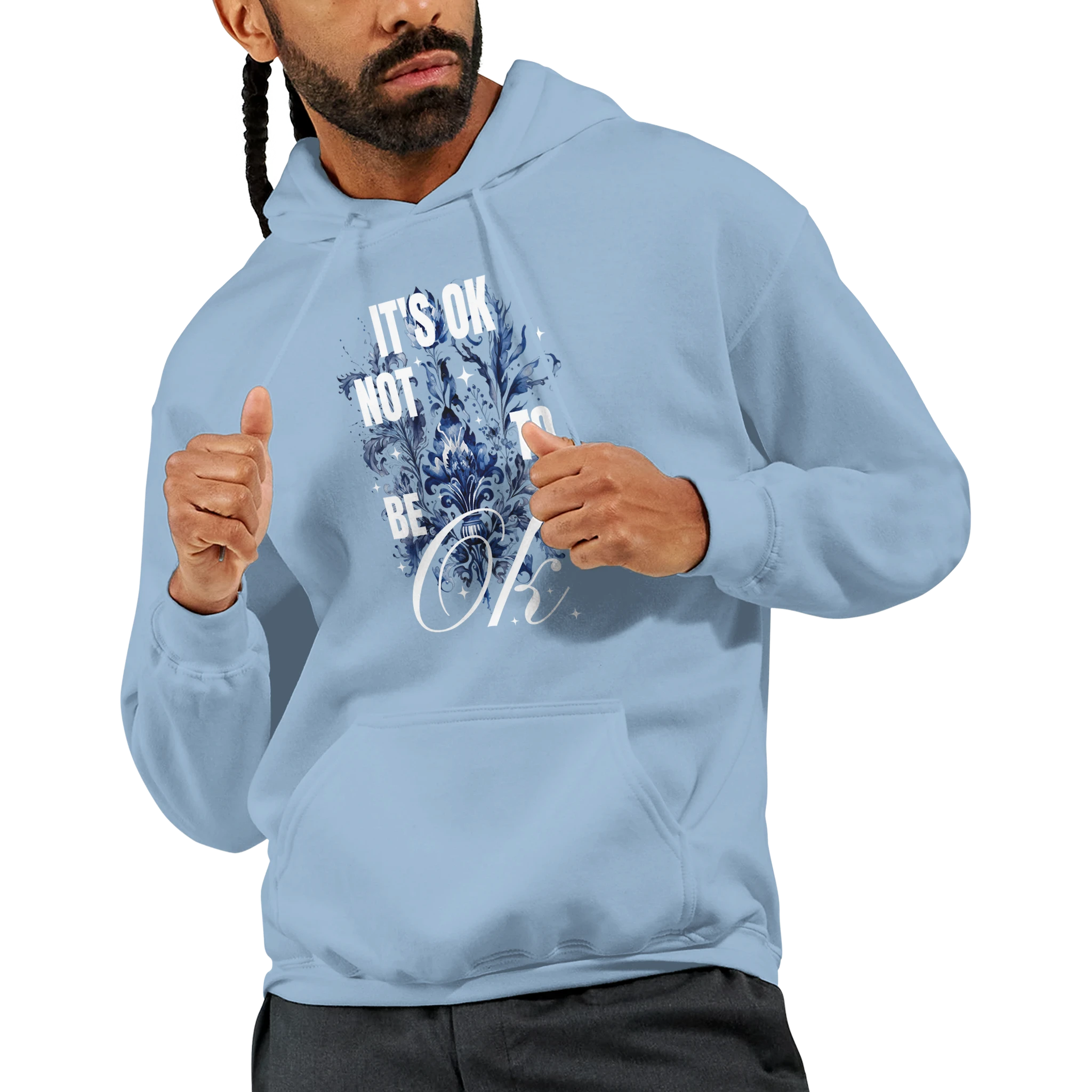 Man wearing a light blue soft cotton blend hoodie with floral artwork and 'It's OK Not To Be OK' slogan.