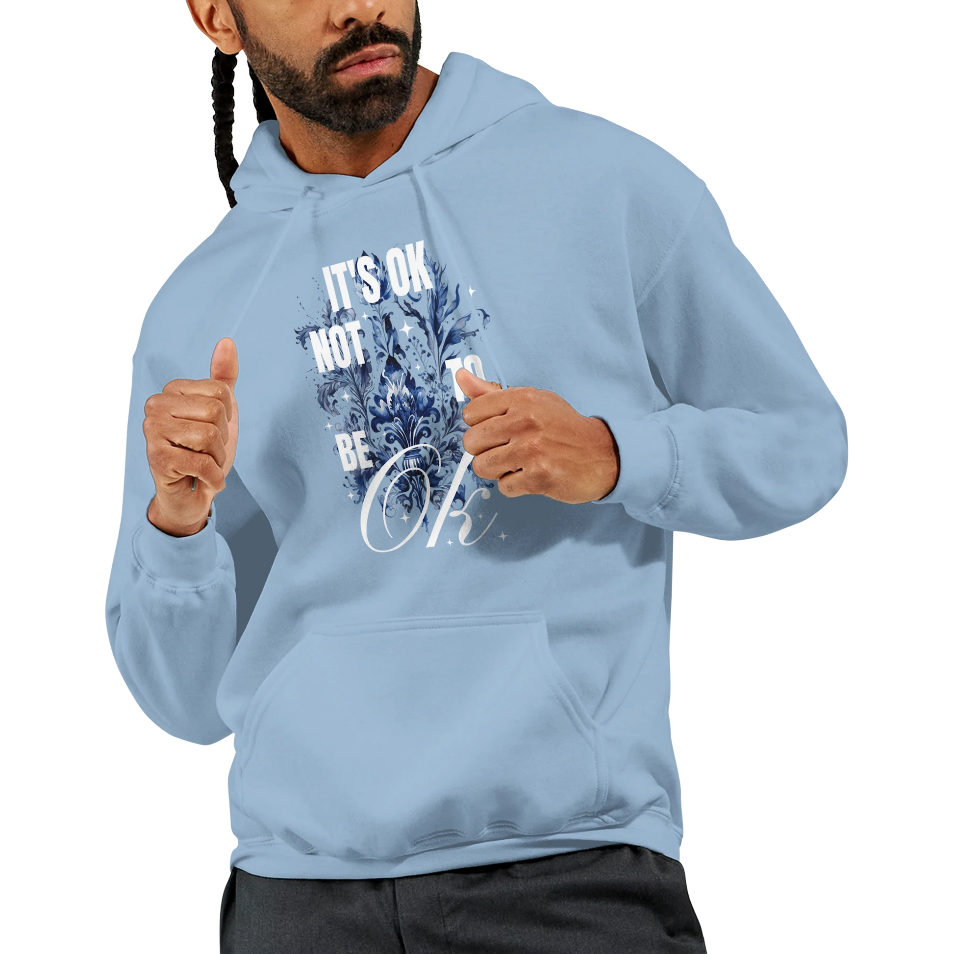 Man wearing a light blue soft cotton blend hoodie with floral artwork and 'It's OK Not To Be OK' slogan.