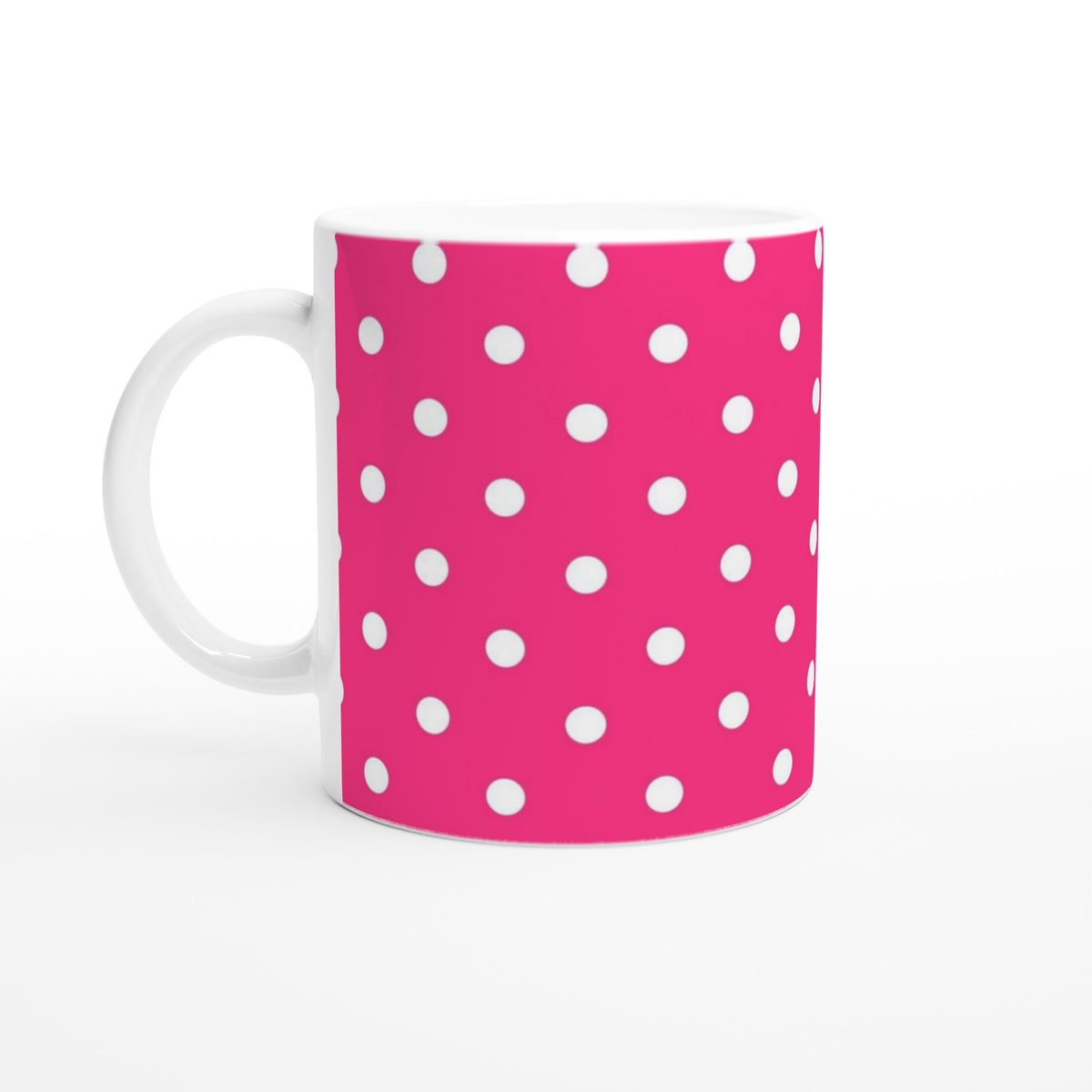 Hot pink ceramic mug featuring white polka dots for a retro look. Perfect coffee or tea cup for daily brewing, office use, or gifting.