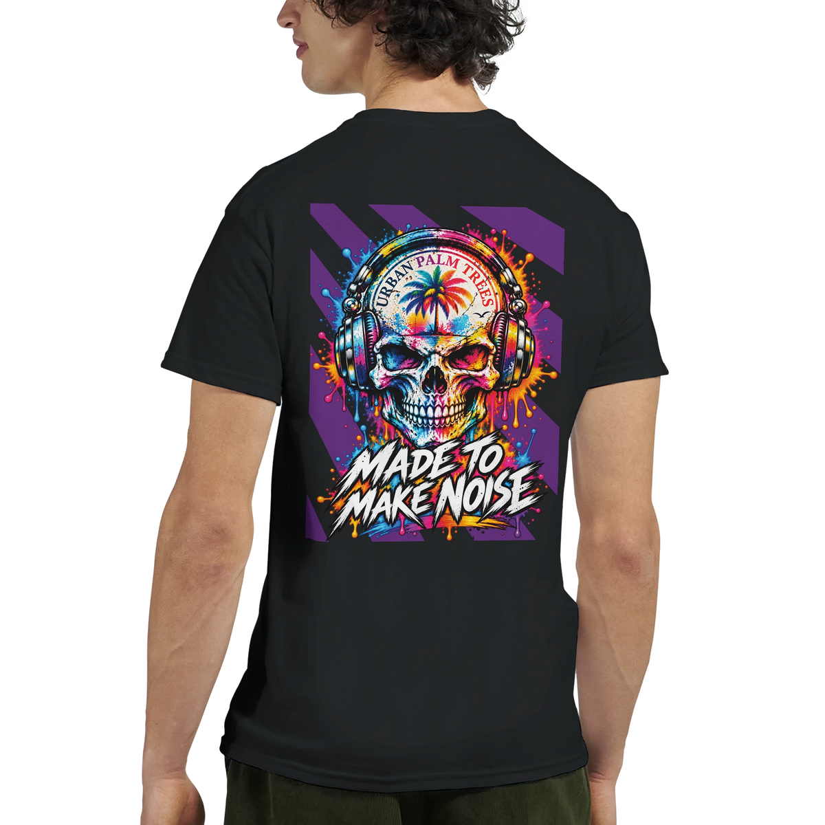 Black t-shirt back featuring colorful skull wearing headphones, palm tree graphic, and "Made To Make Noise" text on purple background.