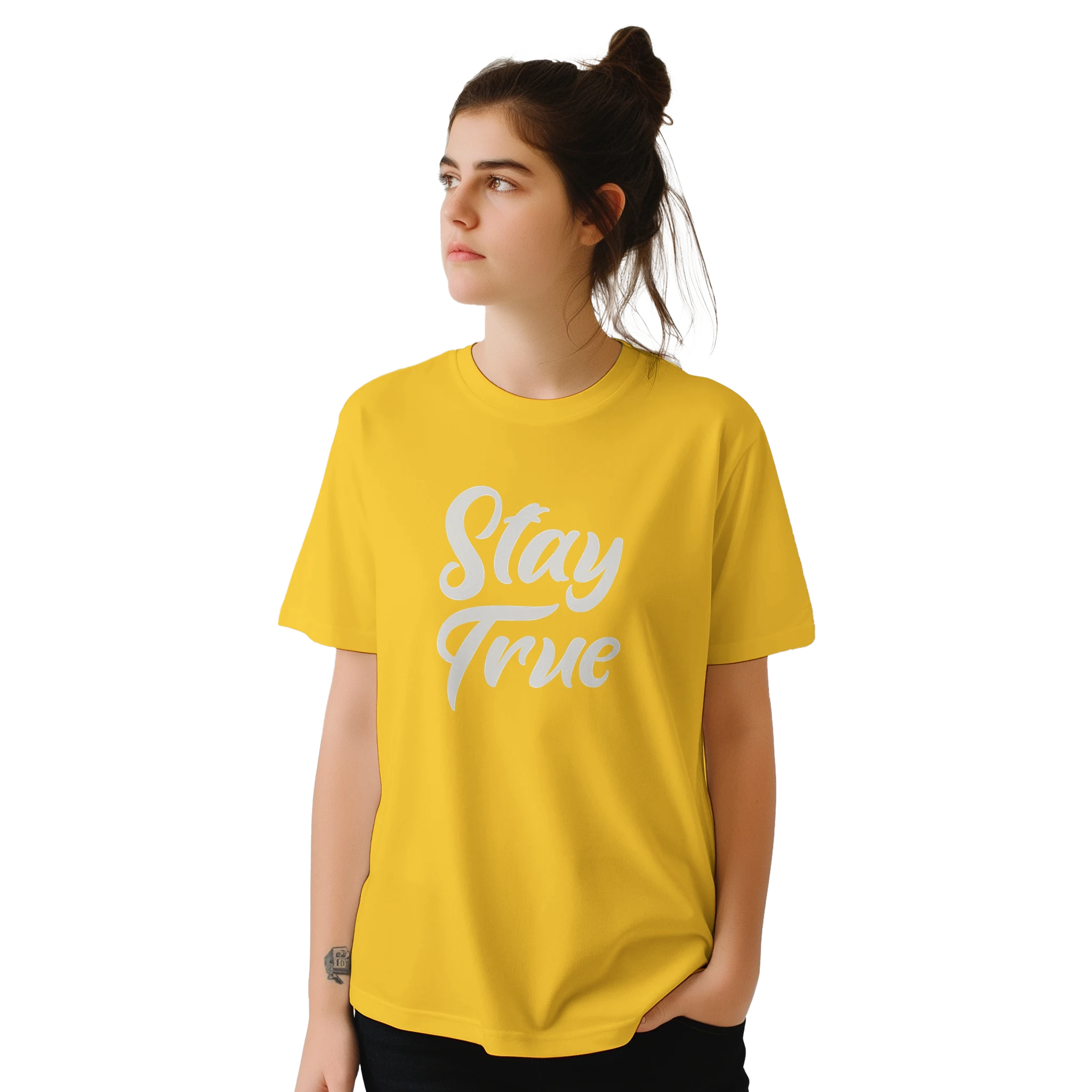Woman in yellow Stay True T-shirt with retro slogan, urban palm trees vibe.