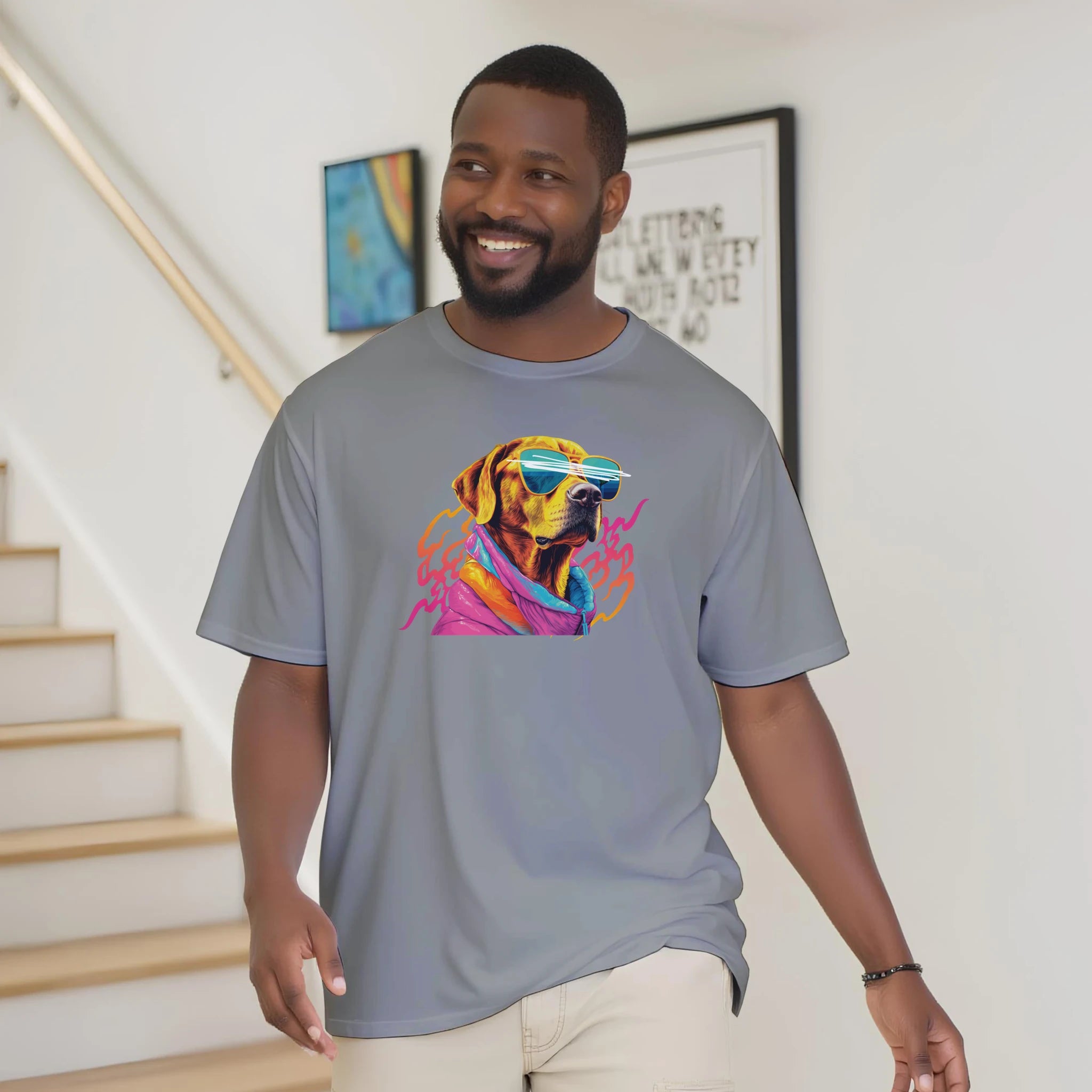 Man in gray Cool Dog T Shirt with colorful dog graphic wearing sunglasses.