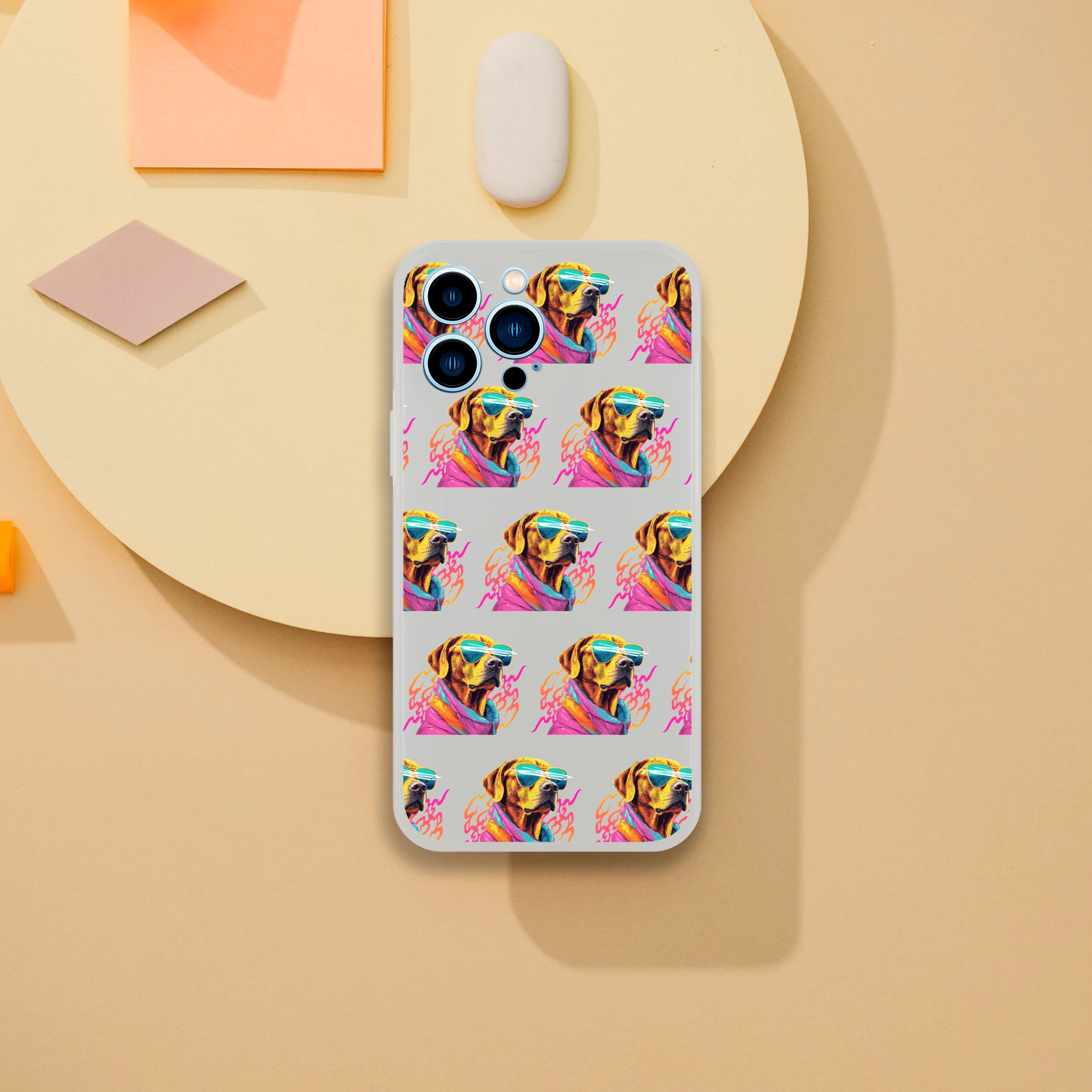 Clear, slim iPhone case featuring a repeating colorful dog wearing sunglasses design for iPhone 13-16.