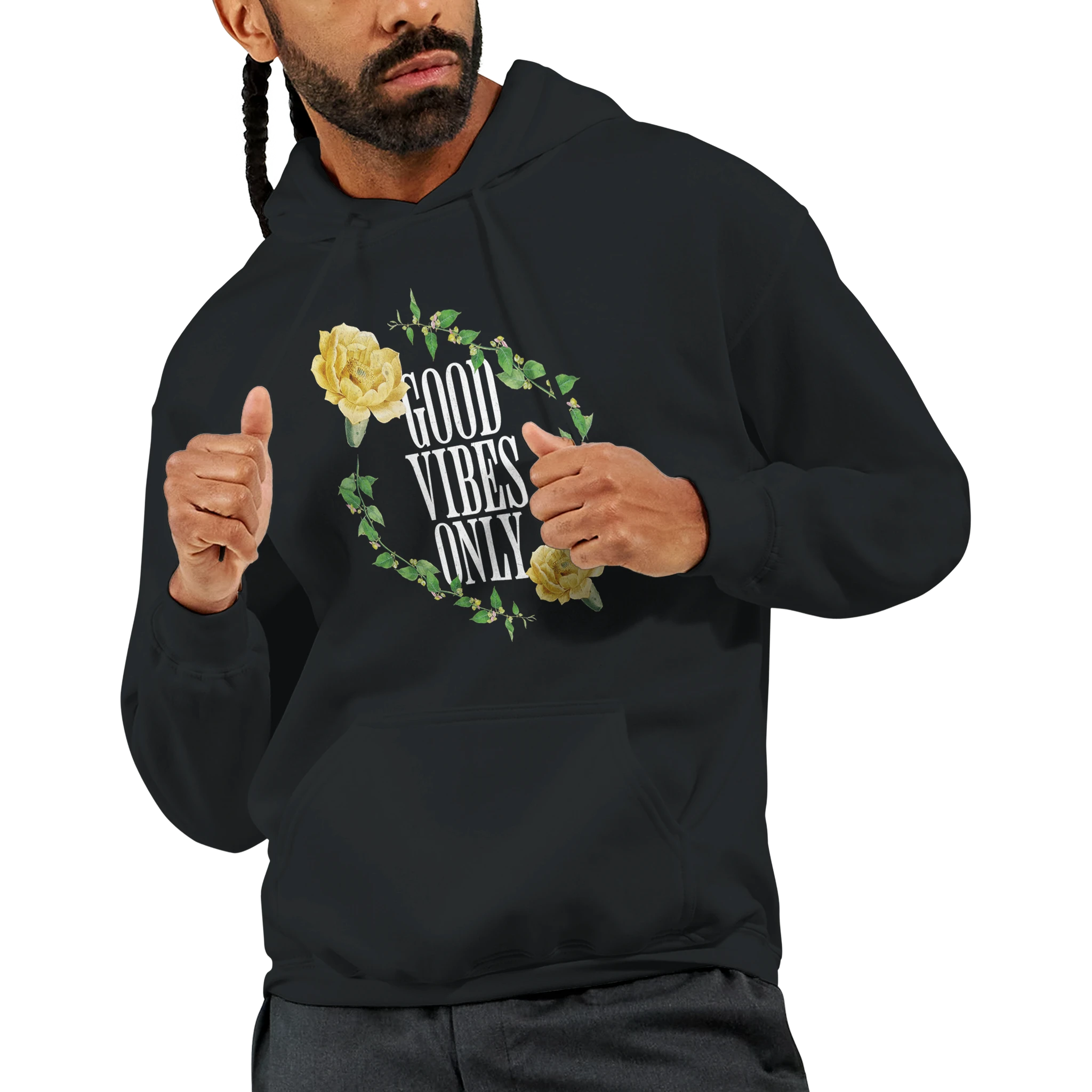 Man in a black 50/50 cotton-poly hoodie featuring a floral circle with Good Vibes Only.