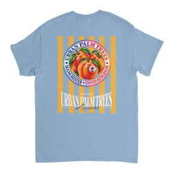 Back of light blue t-shirt featuring retro striped peach graphic with Urban Palm Trees text and Manchester United Kingdom details.