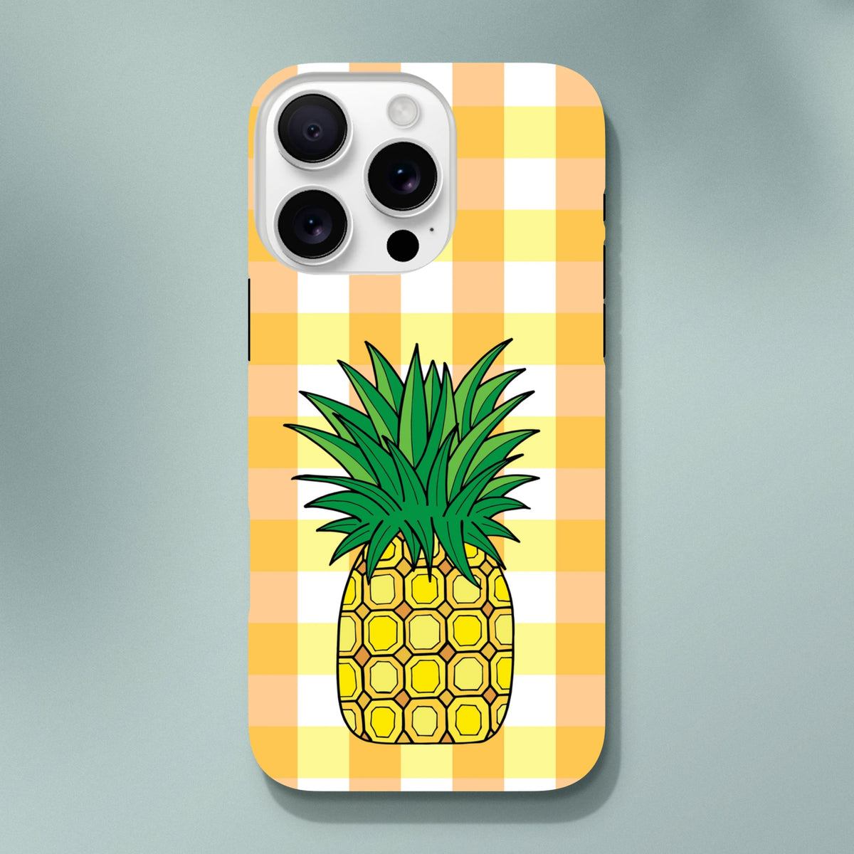 Pineapple gingham iPhone case with yellow checkered pattern and tropical fruit design for drop protection.
