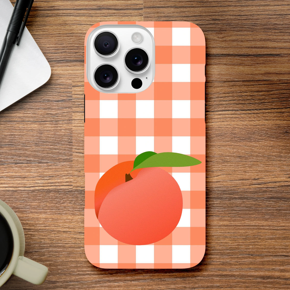 Peach fruit graphic on retro orange and white gingham iPhone case with tough protective design for urban style.