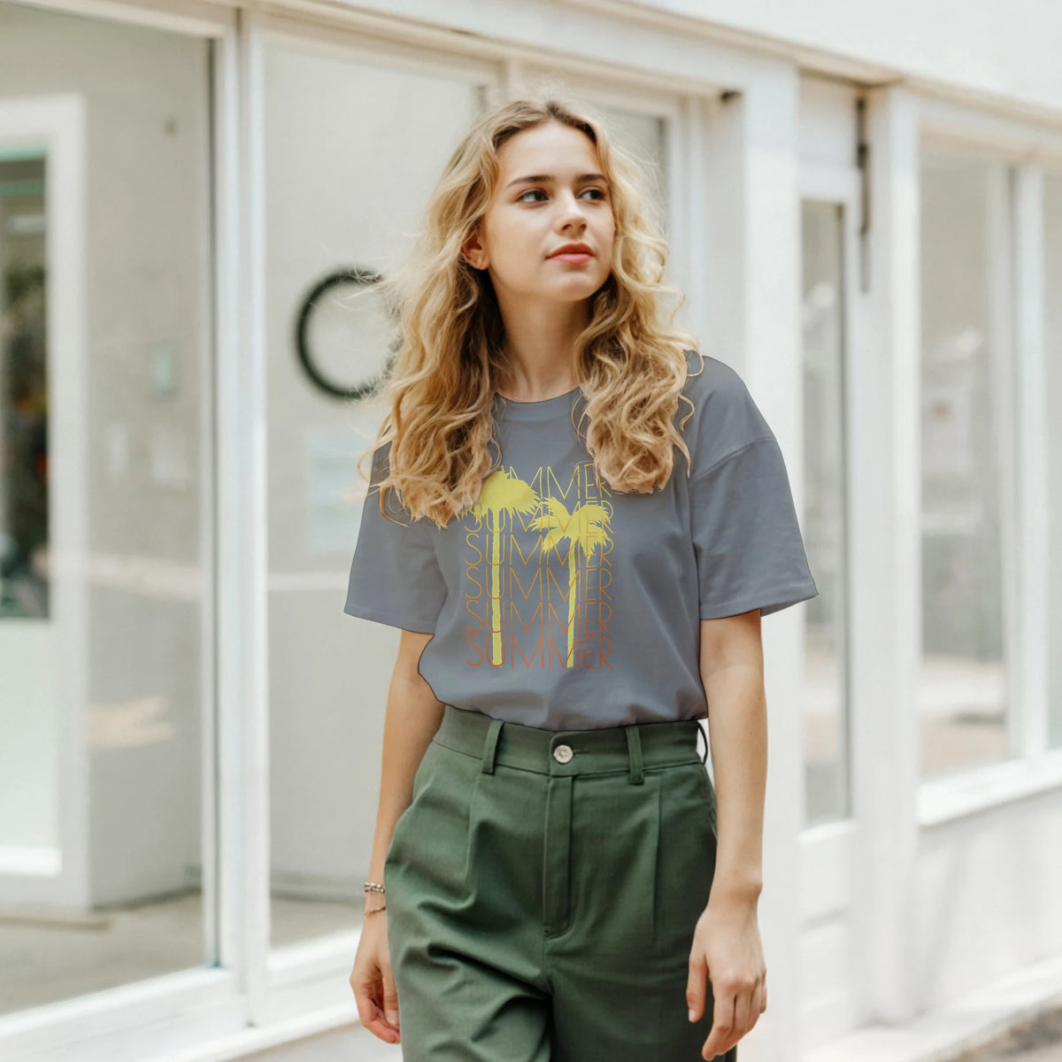 Woman in gray Cute Summer T-Shirt for Women with retro, vintage vibes, standing outdoors.
