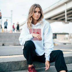 Light blue hoodie featuring a red gingham square with a 3D bow detail, embodying cute coquette style for women.