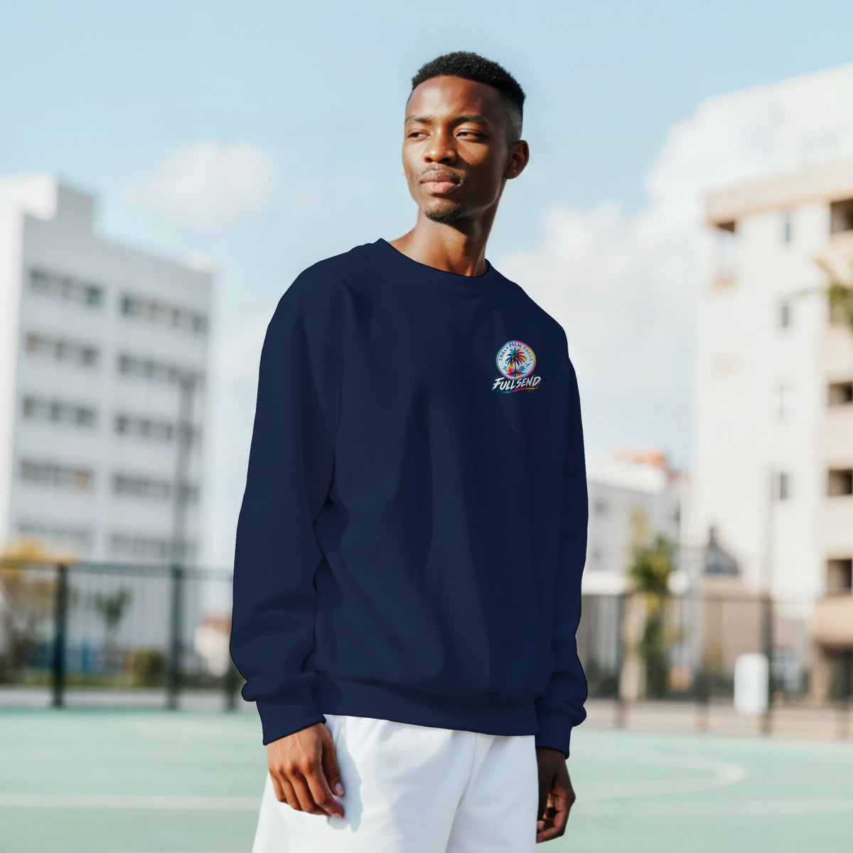 Man wearing navy On Boost Car Sweatshirt with colorful palm tree and Full Send graphic on chest, urban streetwear jumper