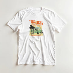 White Tropical Dreamer women's graphic t-shirt (sizes S-XL) in soft cotton blend with palm trees and sunset waves.